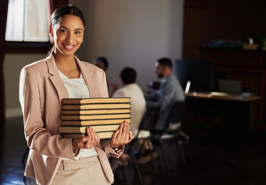 Law books, happy portrait and woman research legal work, office consultation or justice career study. Financial advisor, government consultant and mockup student, lawyer smile or attorney education